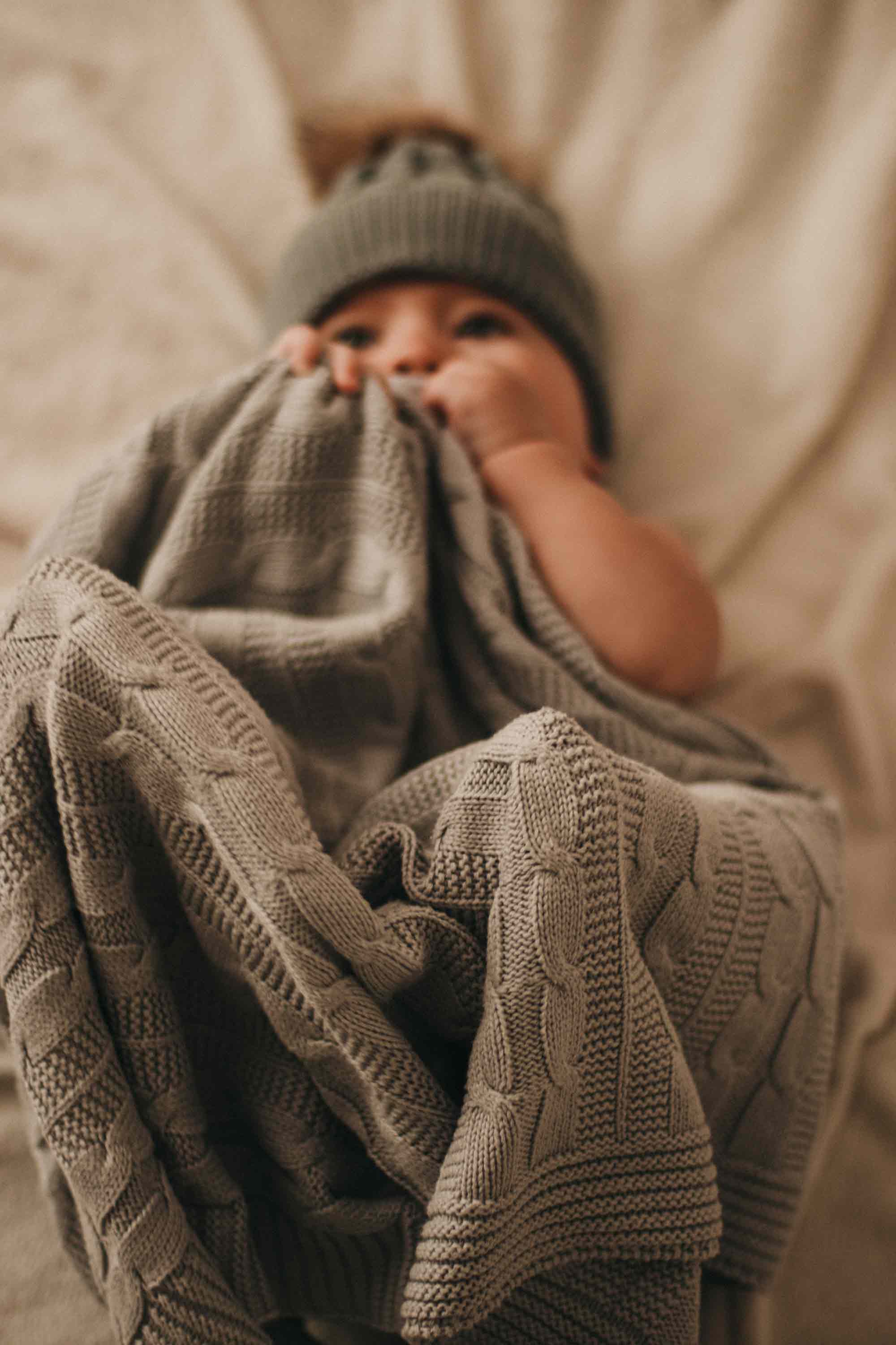 A baby feels safe and comfortable when wrapped in the right organic blanket, whether it be cotton, muslin, merino wool, or bamboo.