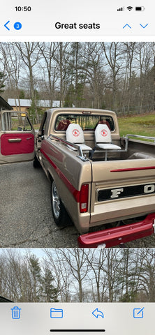 White bucket style truck bed seats with custom logo.