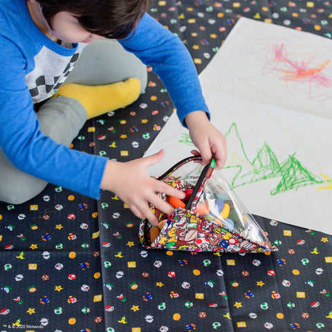 child coloring on splat mat