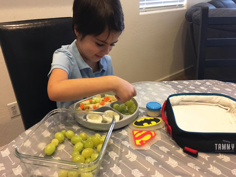 child eating lunch