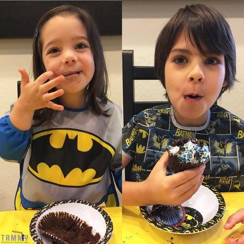 child celebrating batman day