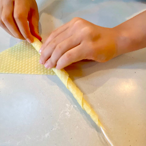 Handrolling Beeswax Candle