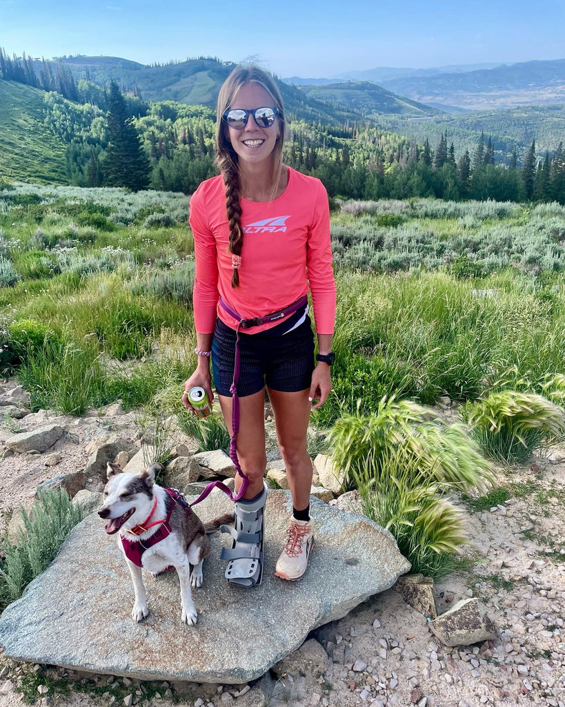 Keely Henninger hiking with her dog