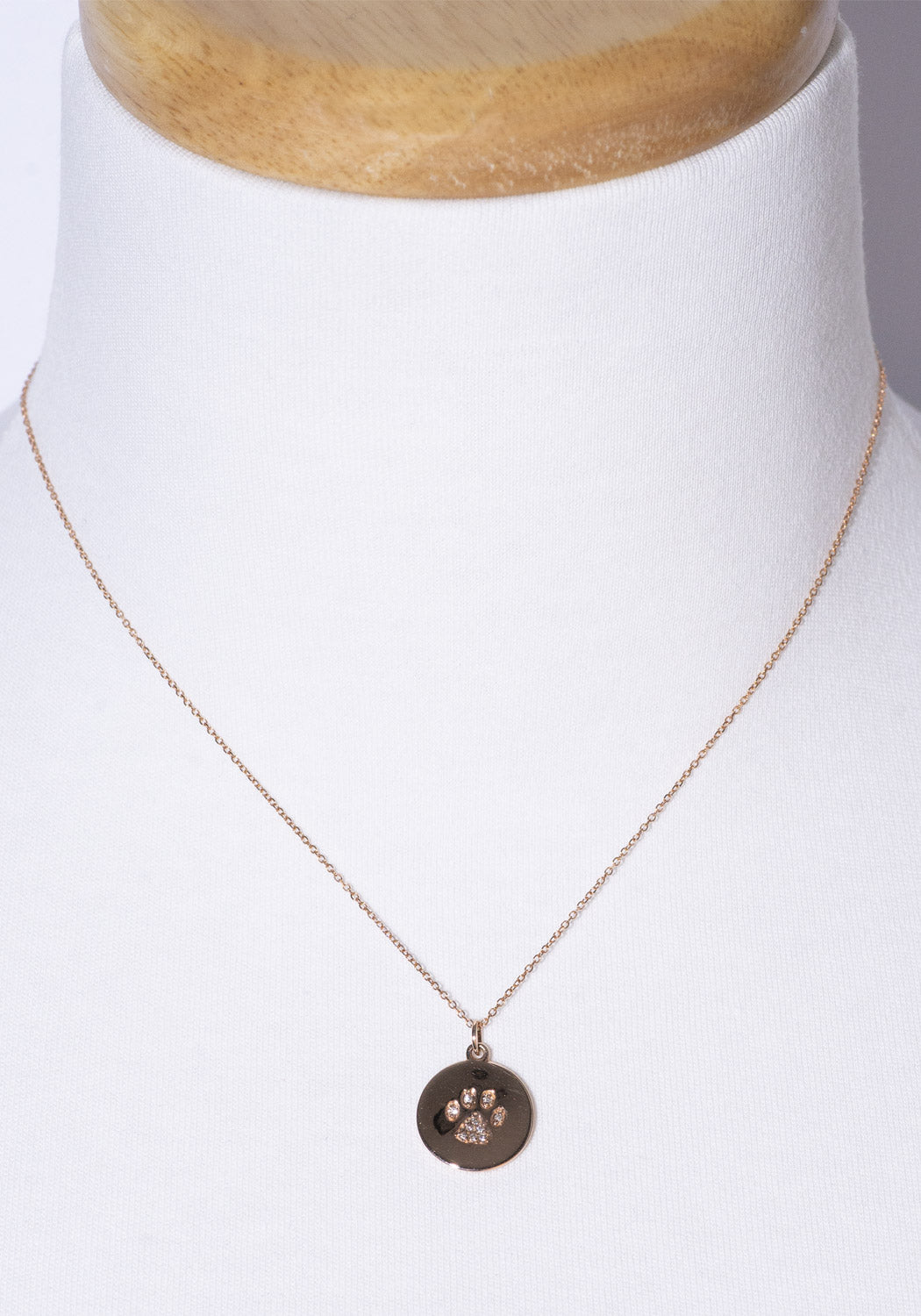 gold and diamond paw print necklace