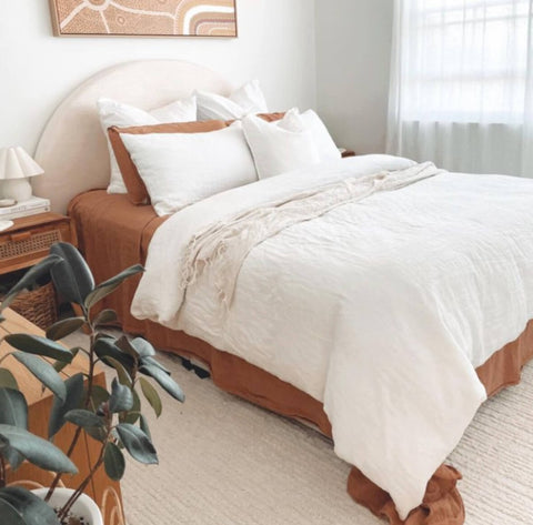Marigold Suri White Rug in neutral bedroom