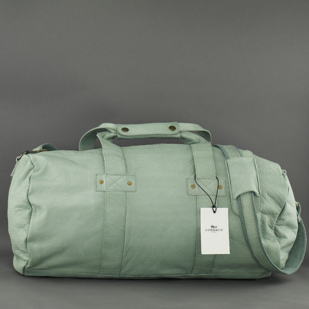 turquoise duffle bag