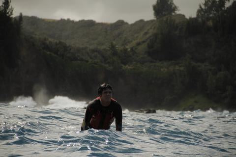 Albee Layer, surfer waiting for it in Hawaii