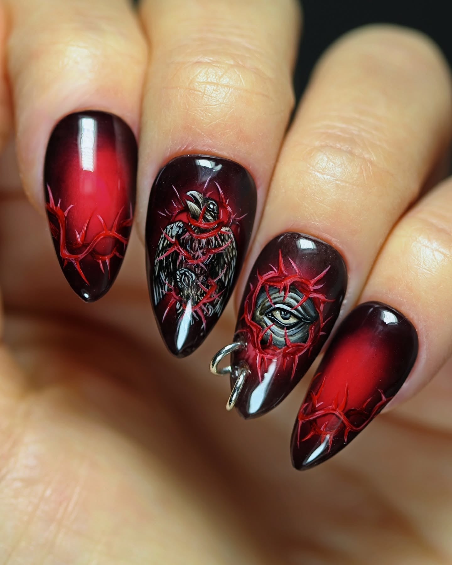 7. Barbed Wire and Gothic Symbolism Nails - red and black nail ideas