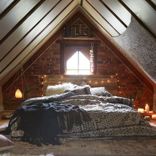 9. Rustic Boho Loft with Brick Accent Wall - attic bedroom ideas