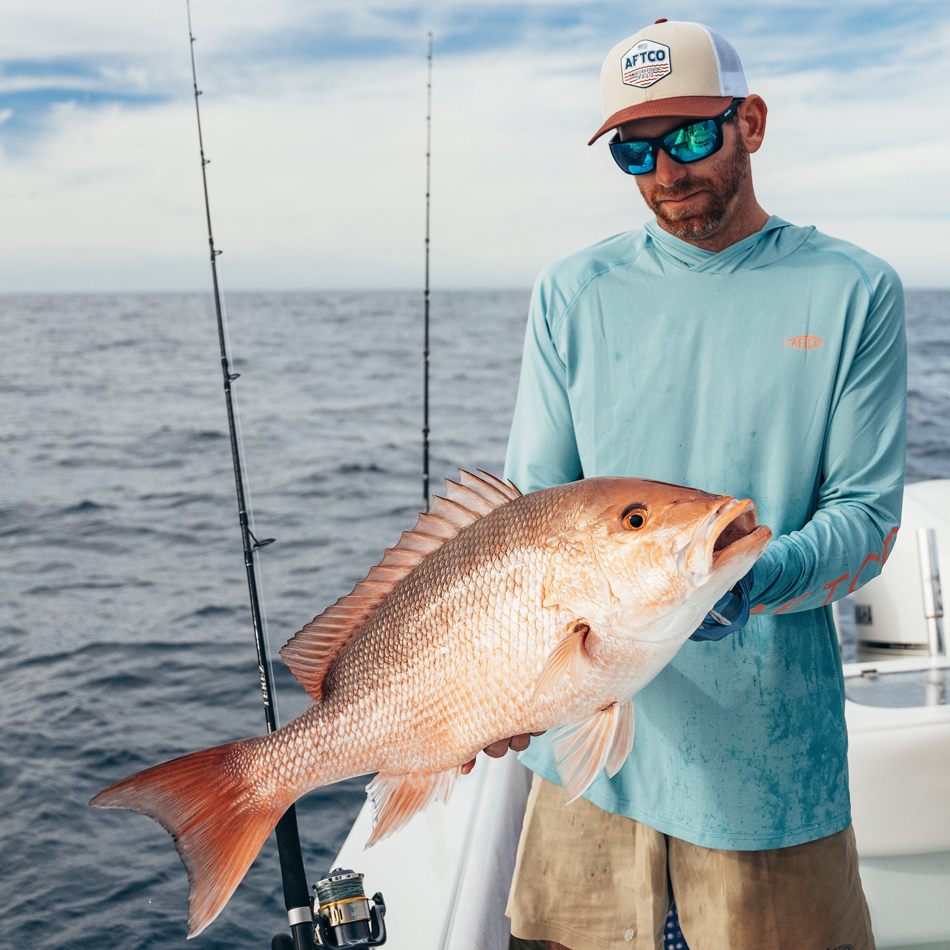 Cody Chivas holding a snapper