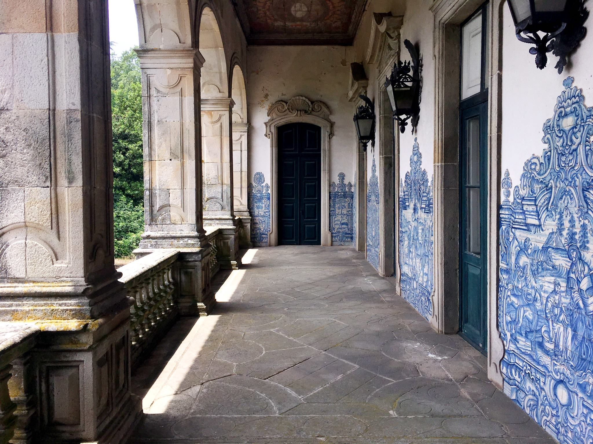 A loggia with a tile wall.