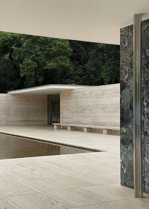 A courtyard with shallow water feature at the Barcelona Pavillion