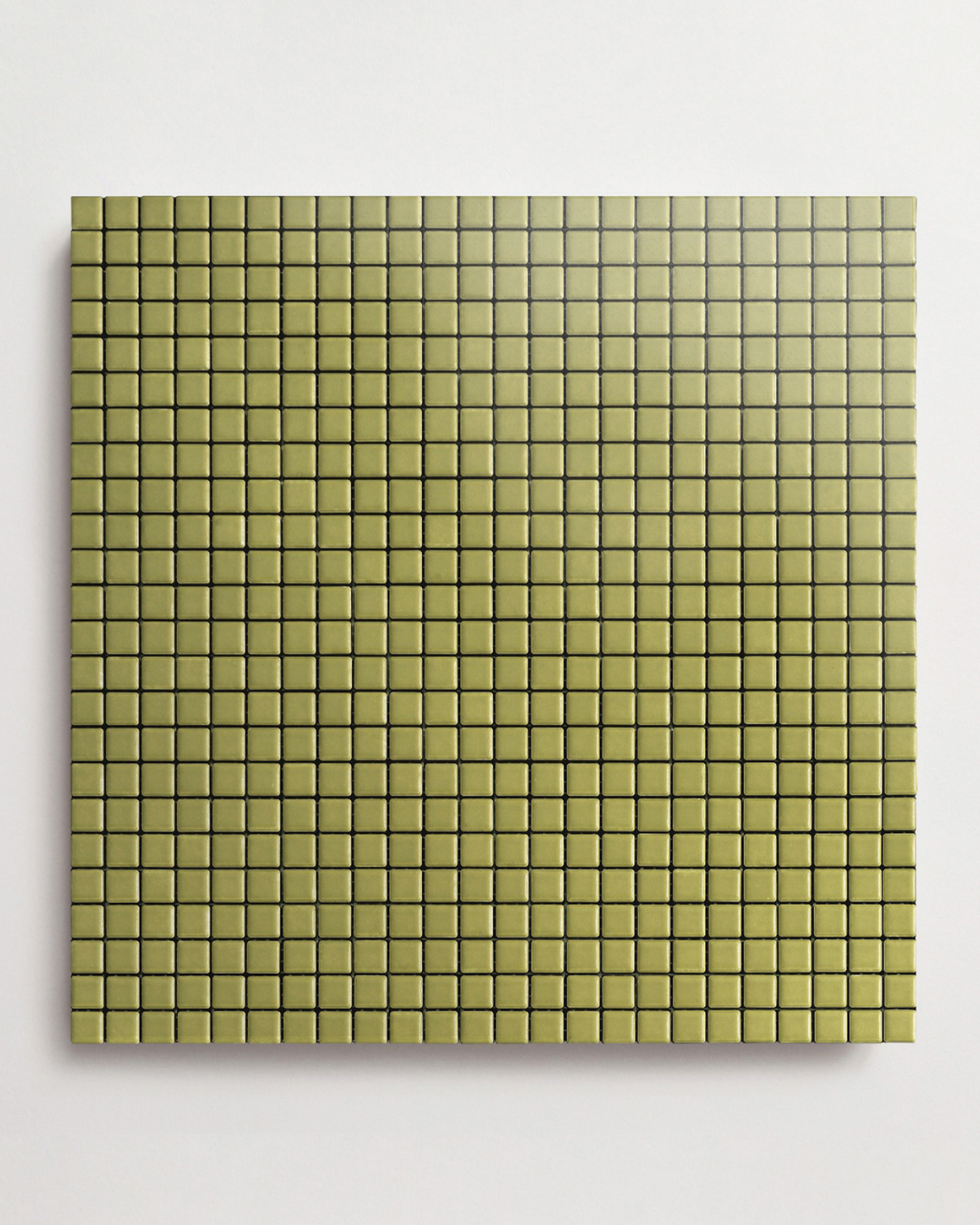 A product photo of tiny avocado green tiles.