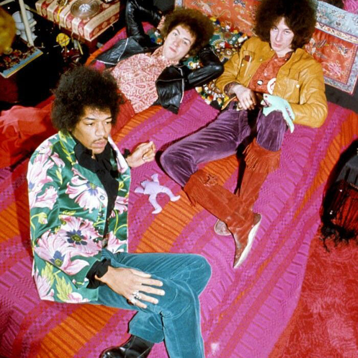 jimi hendrix and band; lots of velvet and tapestry.