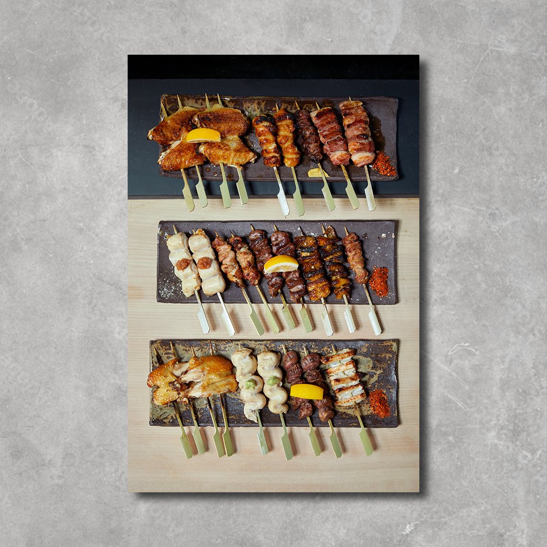 Japanese cookbook with skewered appetizers