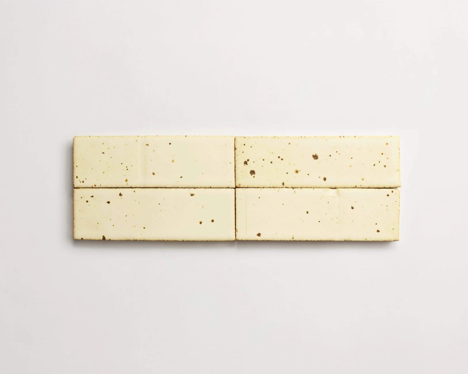 yellow speckled brick tile