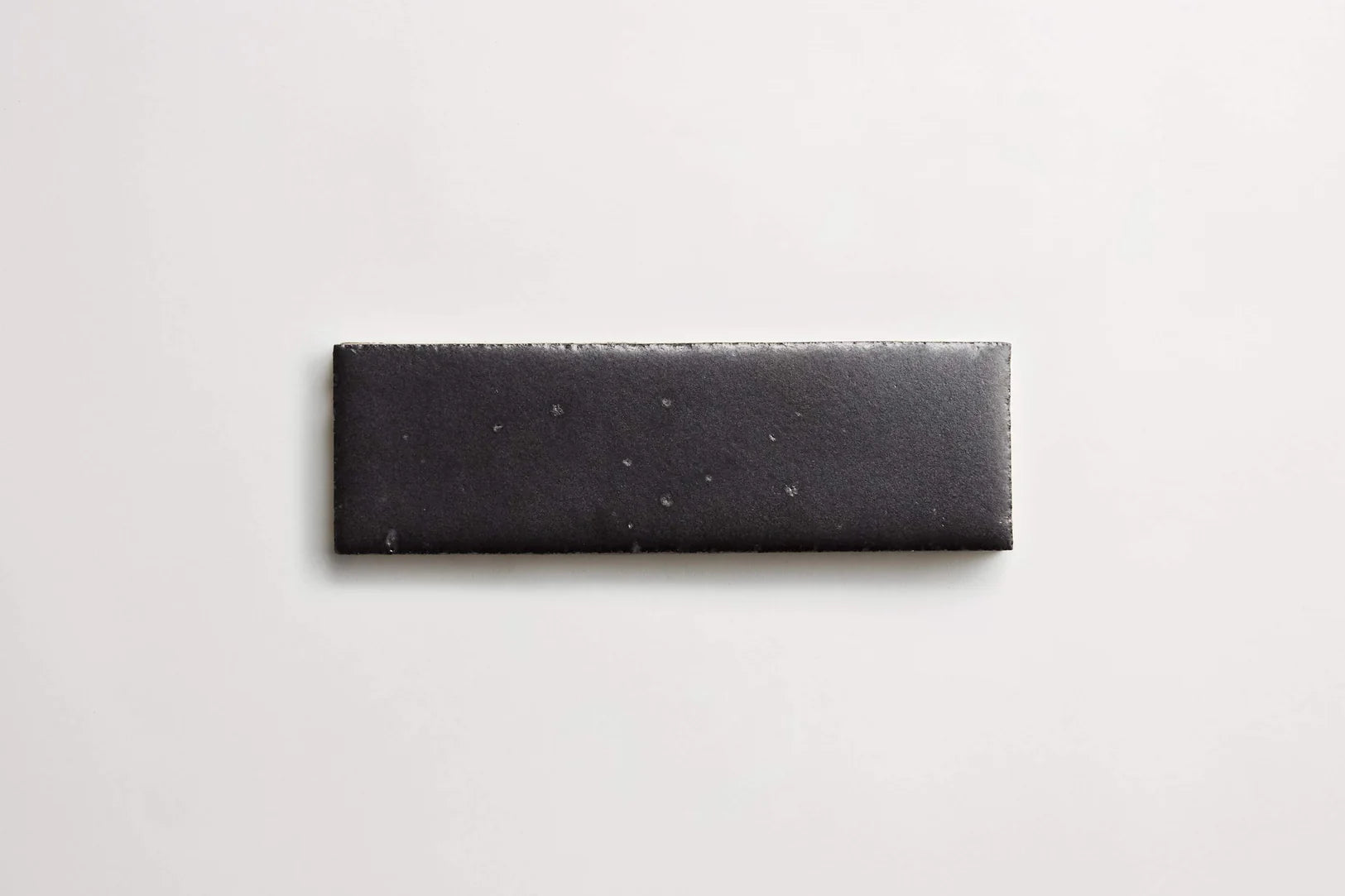 matte black brick tile