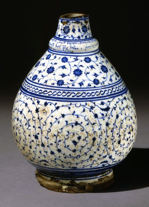 Intricate pattern on a blue and white vase.
