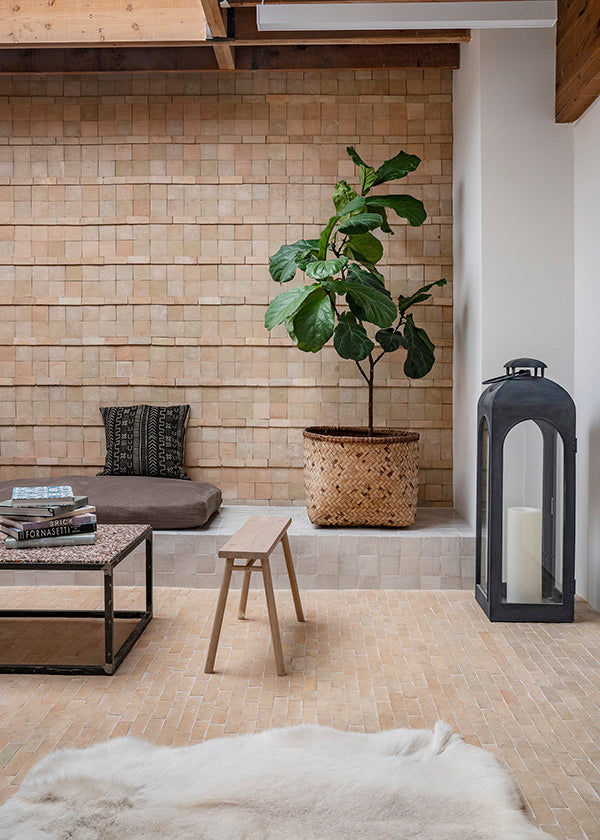 a bohemian living space featuring clé zellige bejmat and square tile in unglazed natural zellige