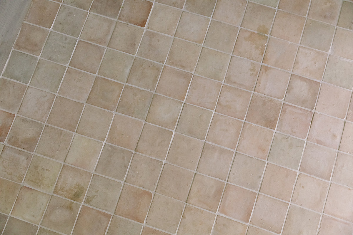 clé zellige square tile in unglazed natural installed on the floor
