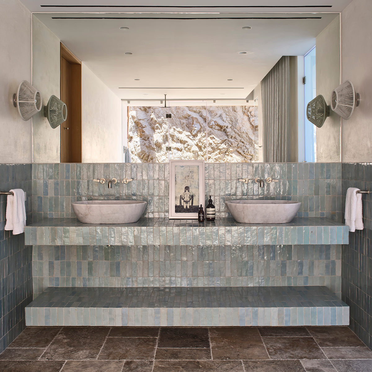 a contemporary bathroom featuring clé zellige bejmat tile in tea ceremony on the bathroom backsplash, wall, and shelving