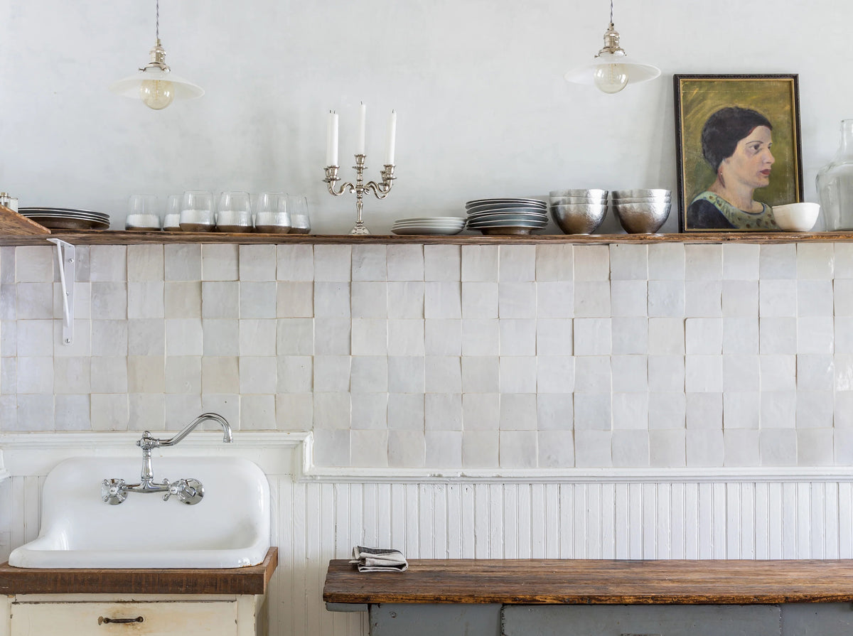 a romantic kitchen featuring clé zellige square tile in weathered white