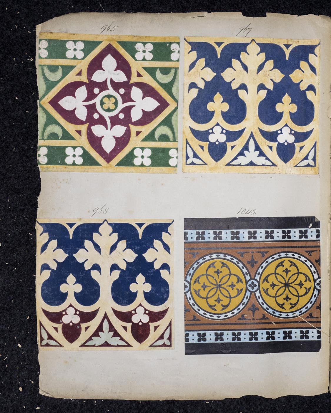 Well-worn books from the early 1800s show tile pattern illustrations by Herbert Minton