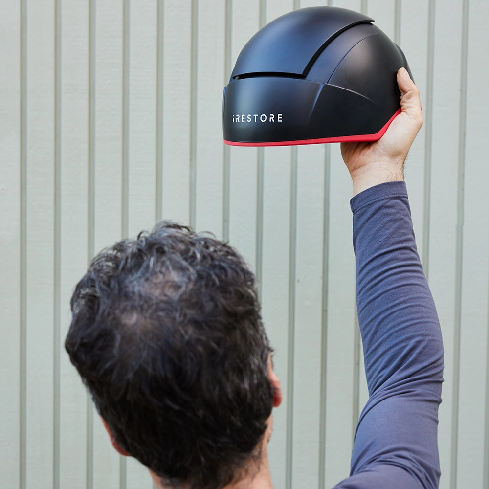 iRESTORE Elite lifted in air