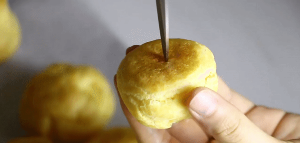 poking the choux pastry