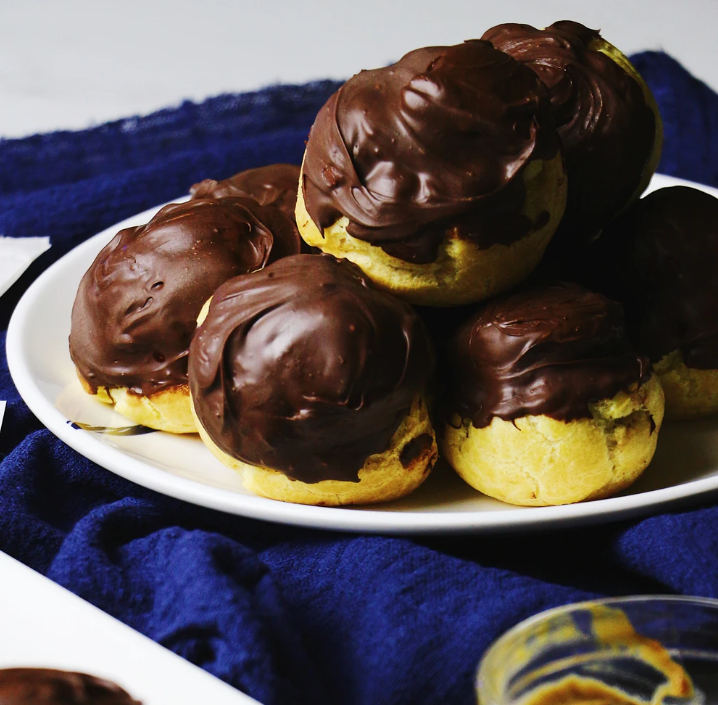 chocolate-coated cream puffs