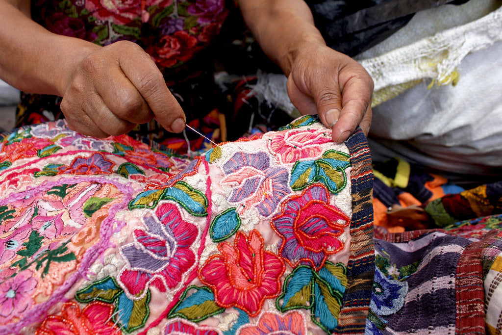 Artisan made embroidery, hand embroidery, machine vs. hand embroidery, difference with embroidery machines, trendy embroidery, embroidery fashion trend, guatemalan embroidery, history of guatemalan textiles, embroidery by hand 