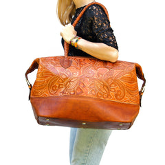 handtooled leather tote, hiptipico leather handbag, free people tooled leather tote bag, Hiptipico ethical fashion blog, ethical fashion blogger,  ethical fashion brands, Slow fashion brands, Artisan made accessories, hiptipico ethical shopping guide,   Ethical holiday gift ideas,  Sustainable gift guide,  Ethical Fashion Gift ideas, Gifts that Give Back, Sustainable Gift Ideas, Free Christmas Delivery, Hiptipico ethical fashion gift guide 