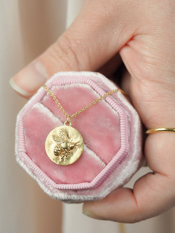Large gold bee coin necklace