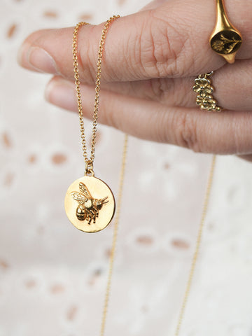 Gold bee coin necklace for layering