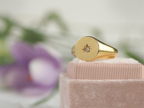 gold vermeil star set signet ring with white sapphire