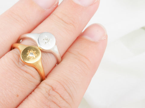 gold and silver star signet ring 
