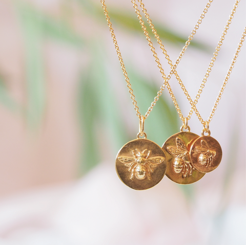 Gold bumblebee coin necklace