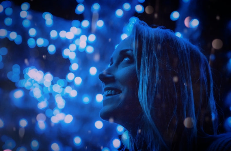 Woman smiling at lights