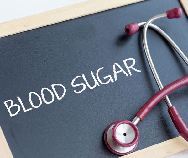 Blackboard with Blood Sugar spelled out with a stethescope