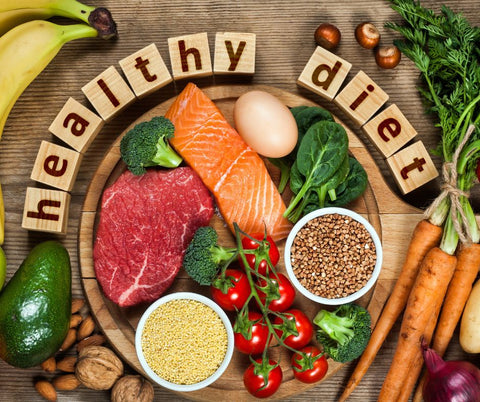 Plate full of healthy foods and Healthy Diet spelled out