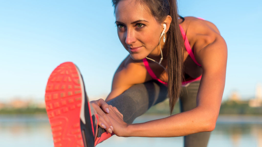 Female athlete stretching