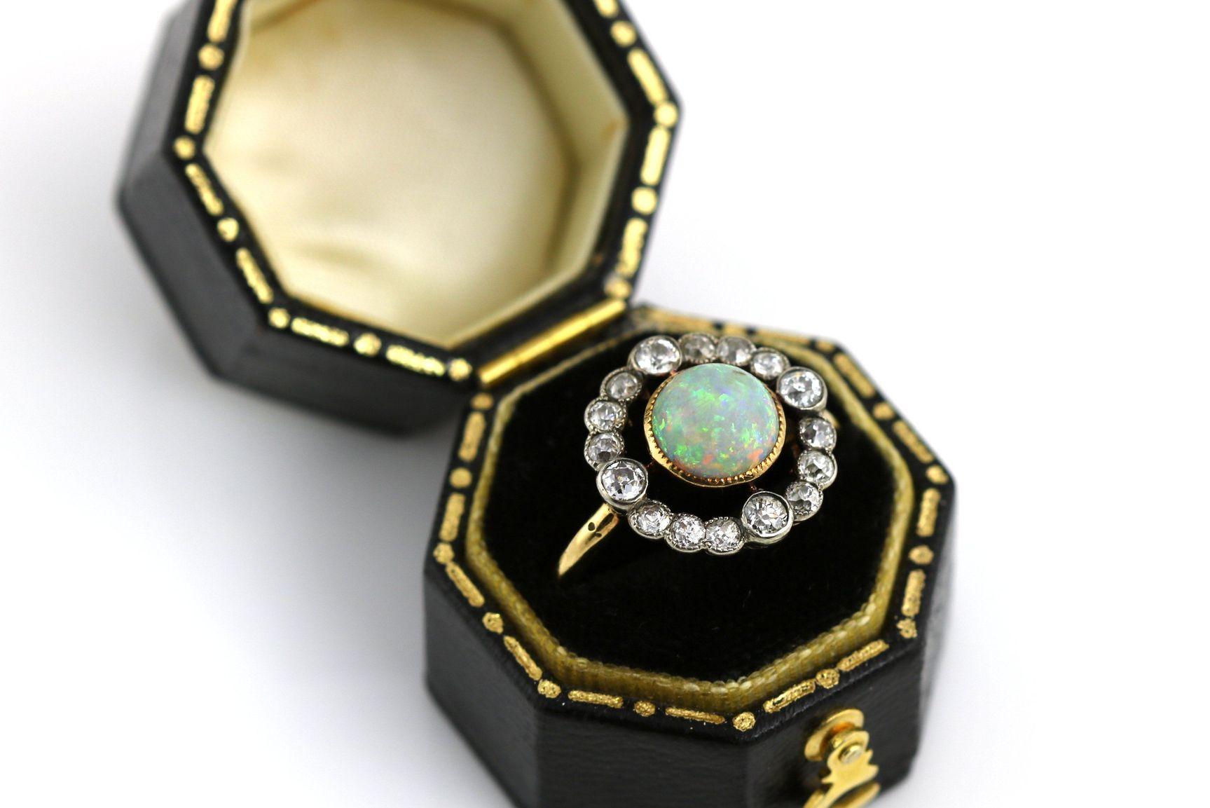 An antique 18ct gold opal and diamond cluster ring