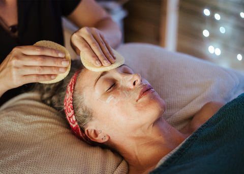 Woman getting Clean Coconut Facial