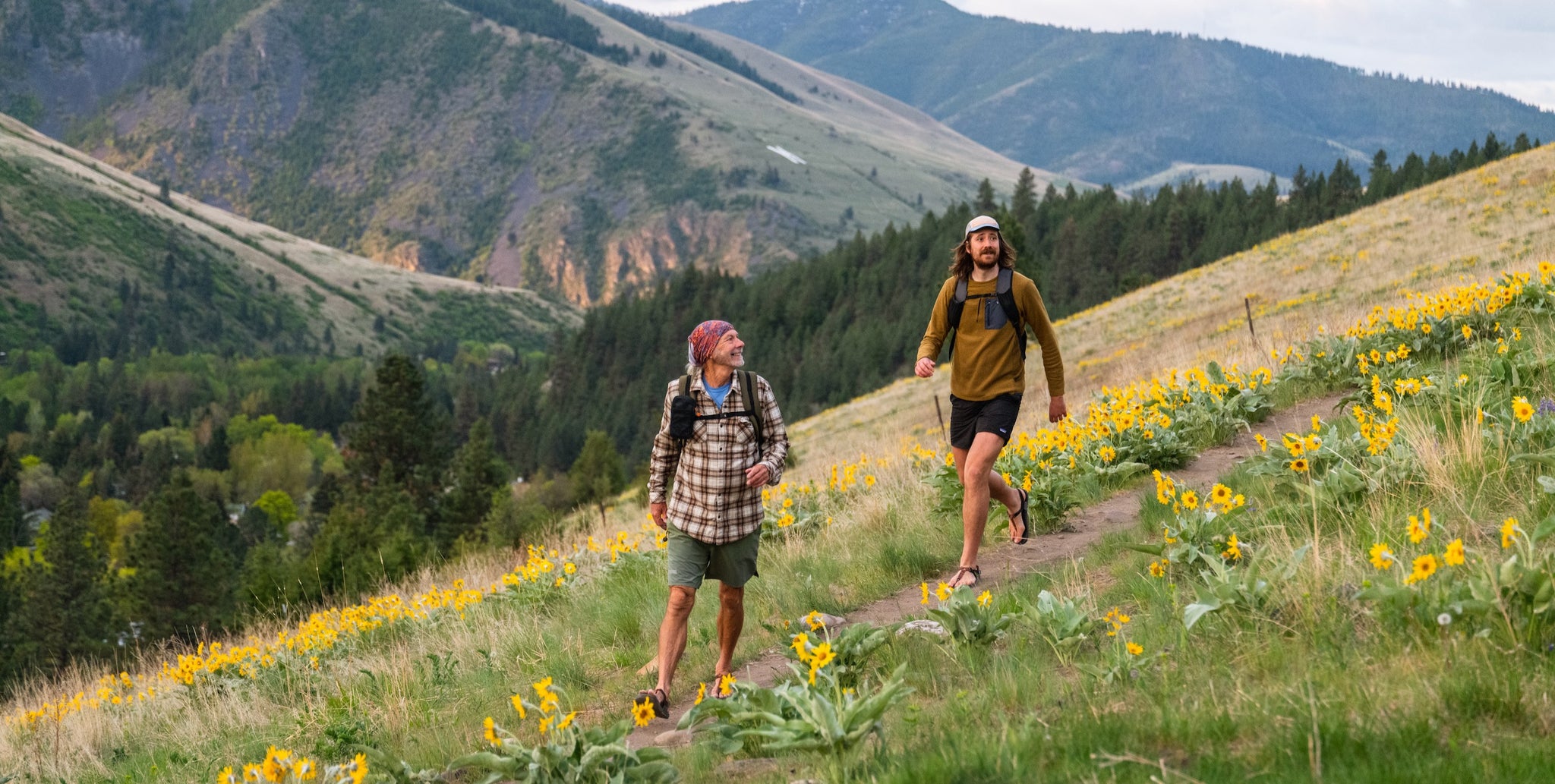 Two people hiking near Bedrock HQ in Missoula, Montana