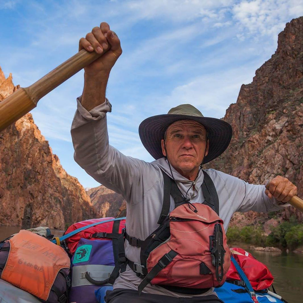 Person Rowing Raft 