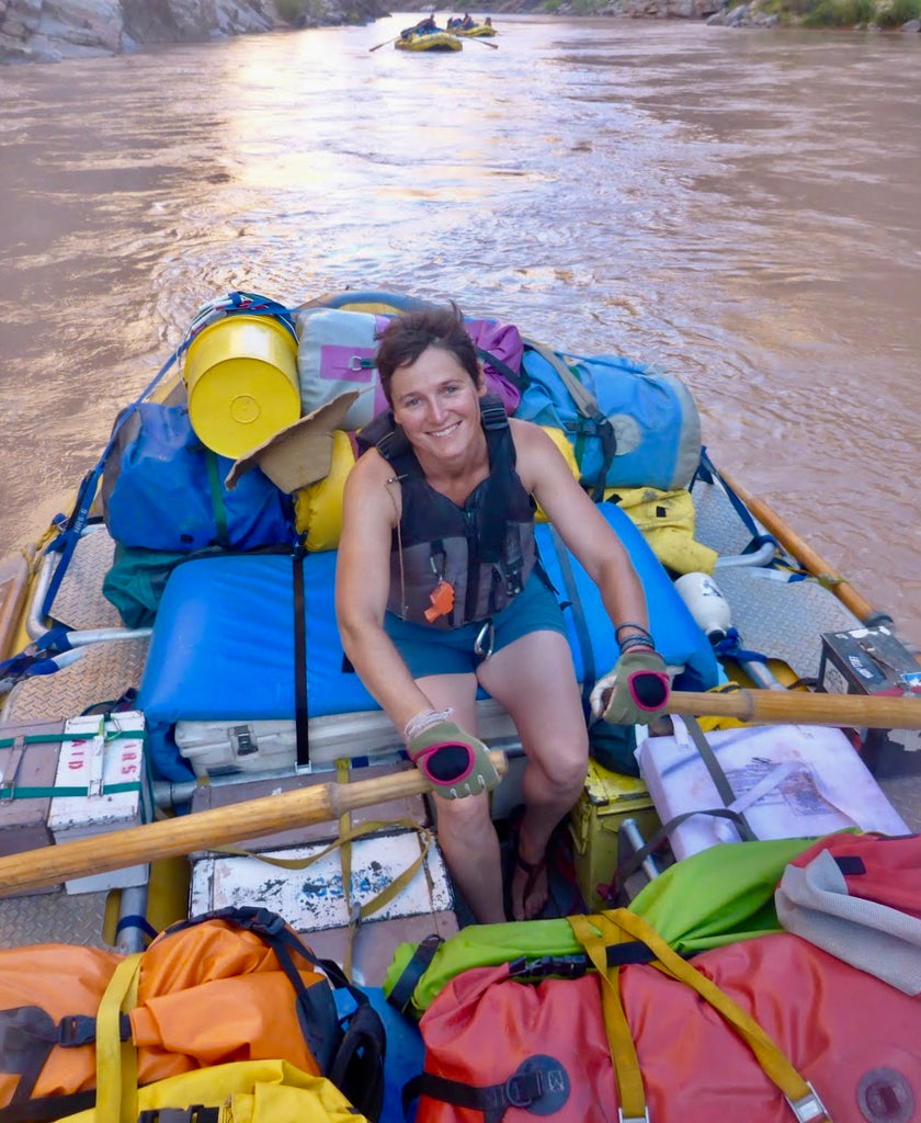 Whitewater Guide Rowing raft in the Grand Canyon