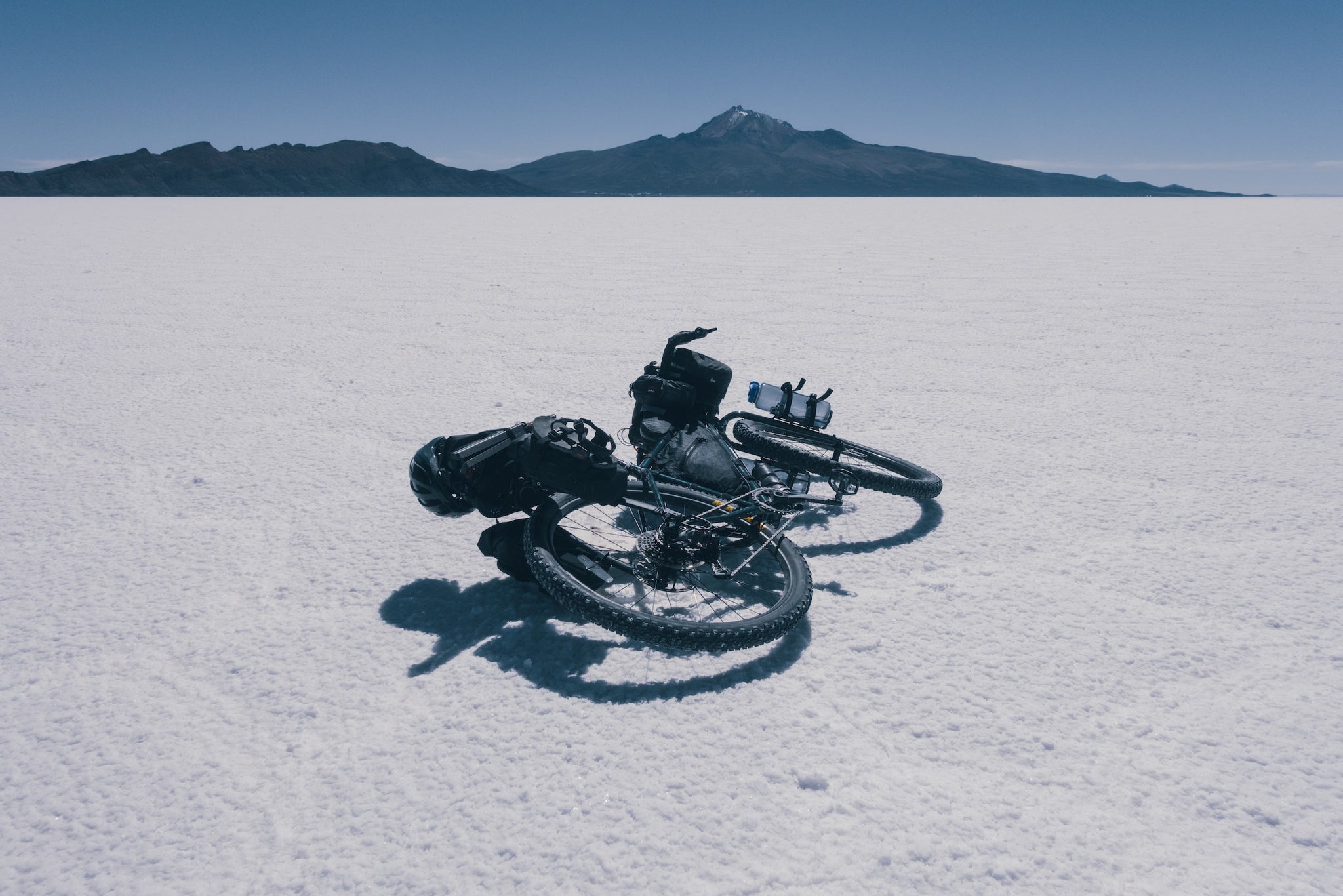 Bike resting on salt flat