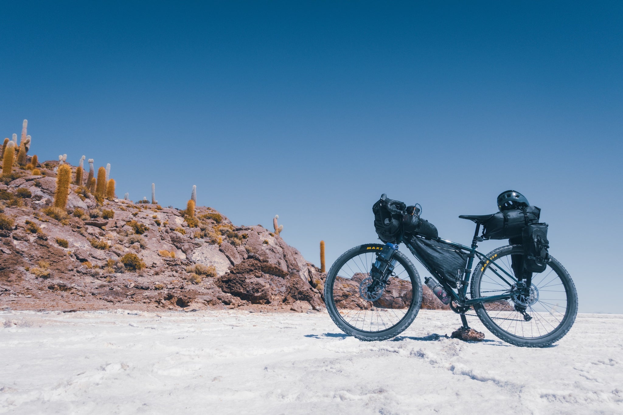 Bike on salt flat by land