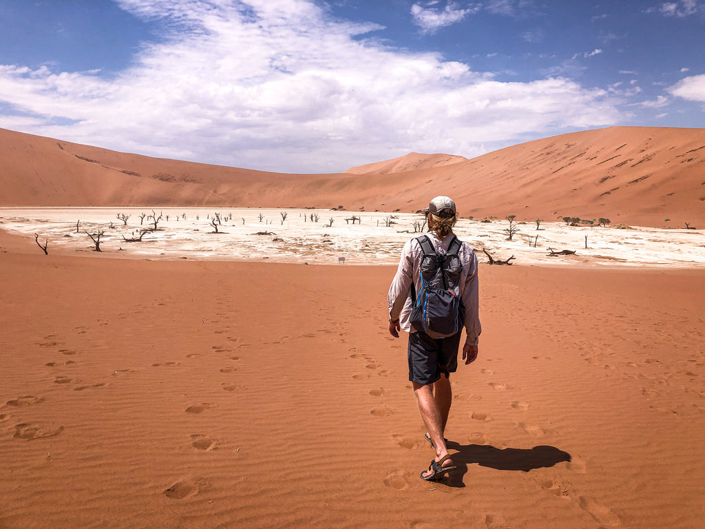 Person hiking in Deadlvei sand dunes