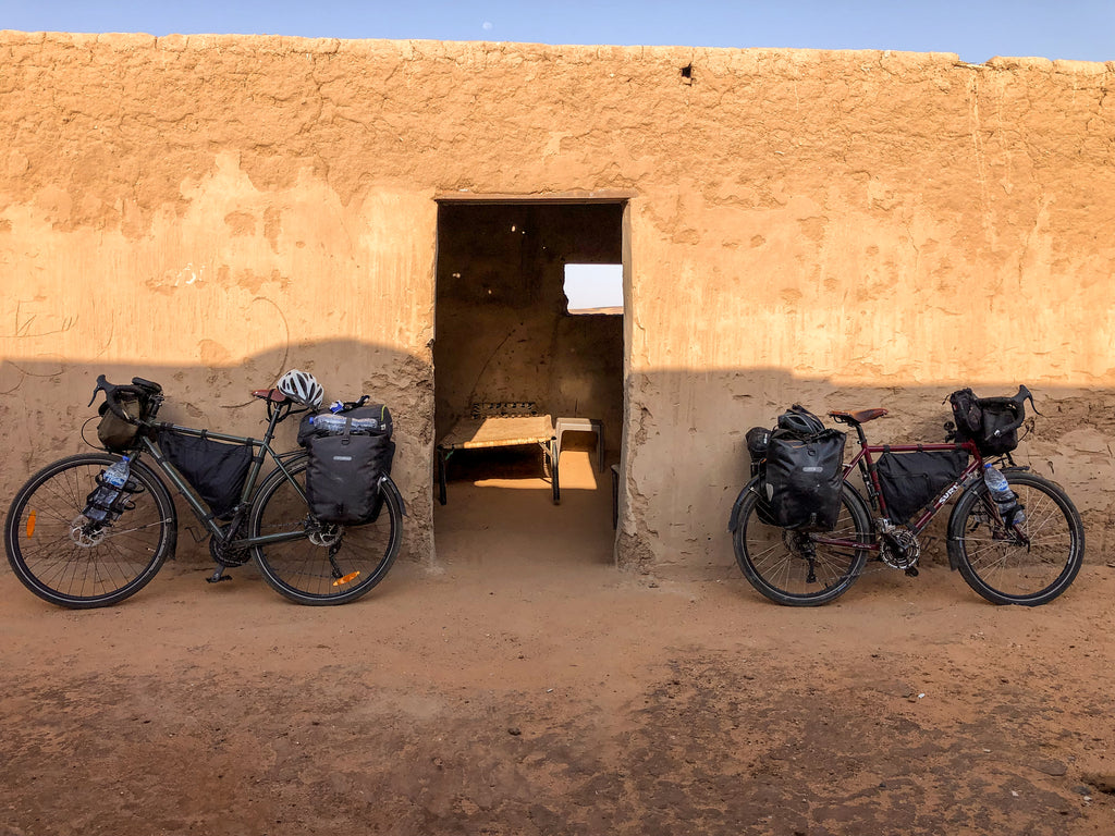 Two bikes with touring gear in African hostel